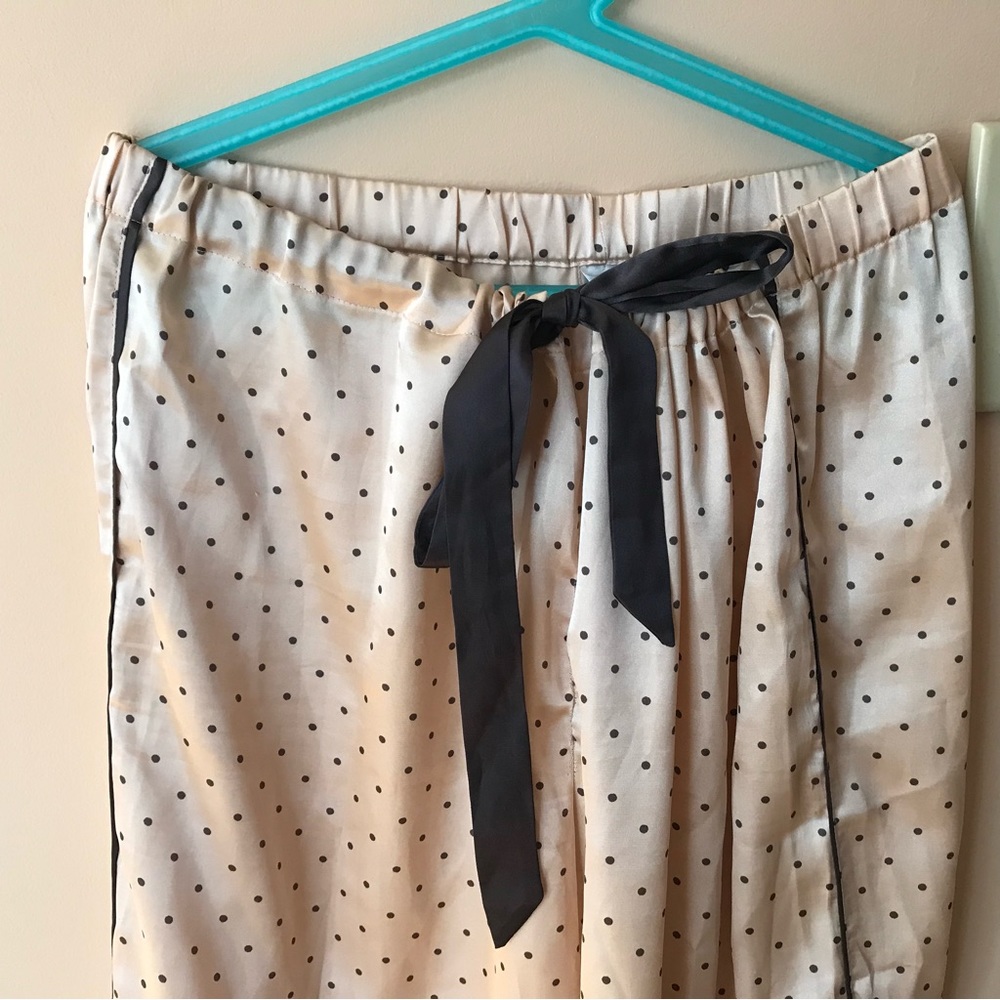 Beautiful La Senza  peach pajama  silk pants with black polka dots.